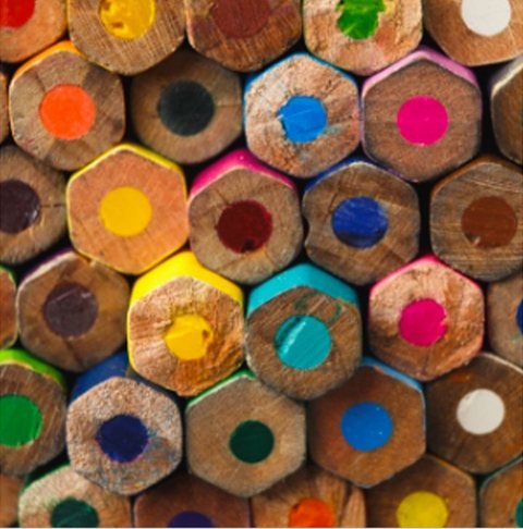 The ends of colored pencils stacked together